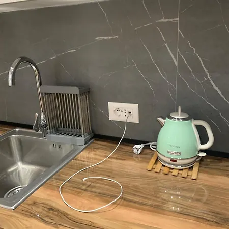 Magnifique Апартаменты Тирана